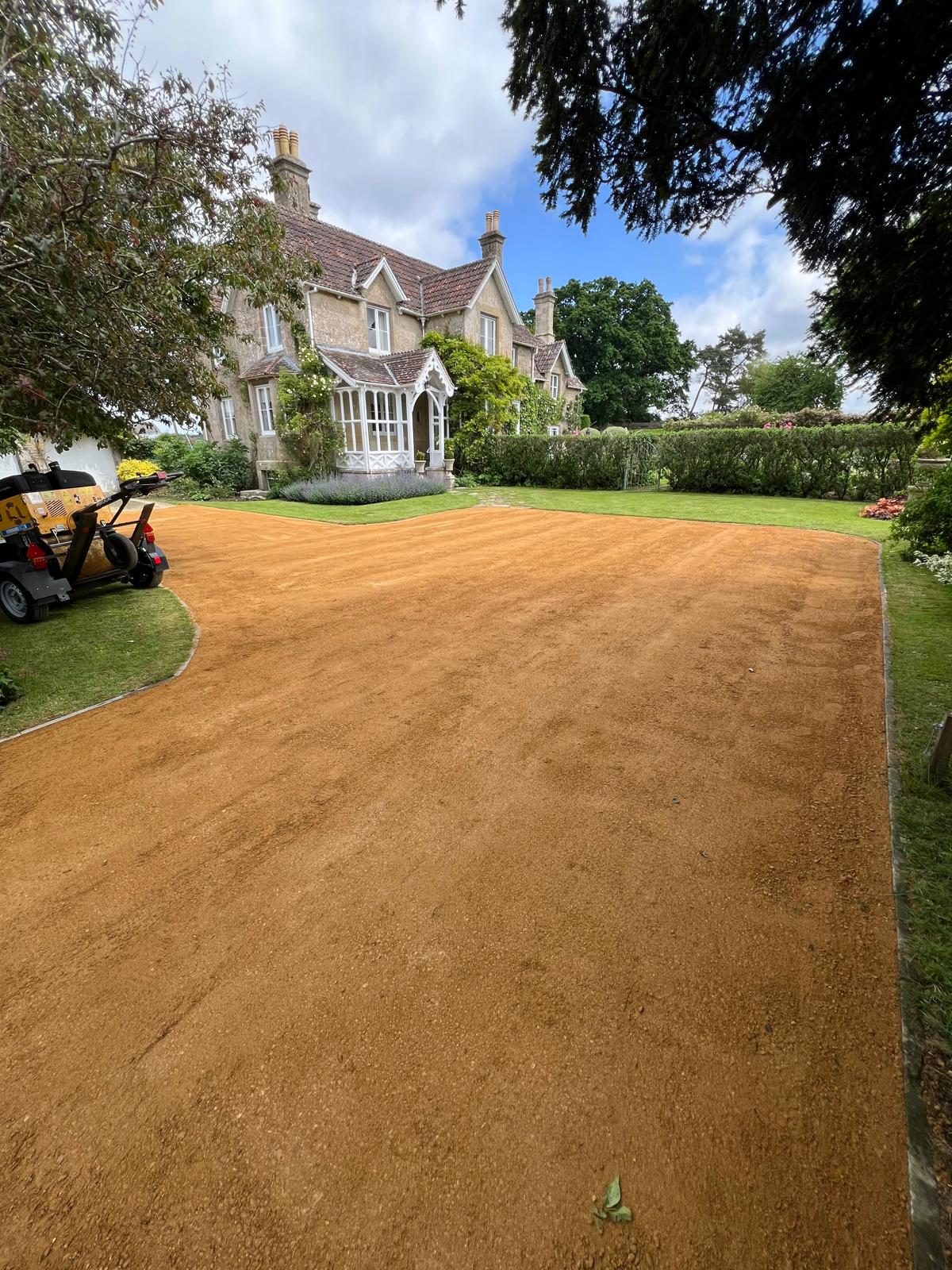 Second view of the same finished gravel driveway