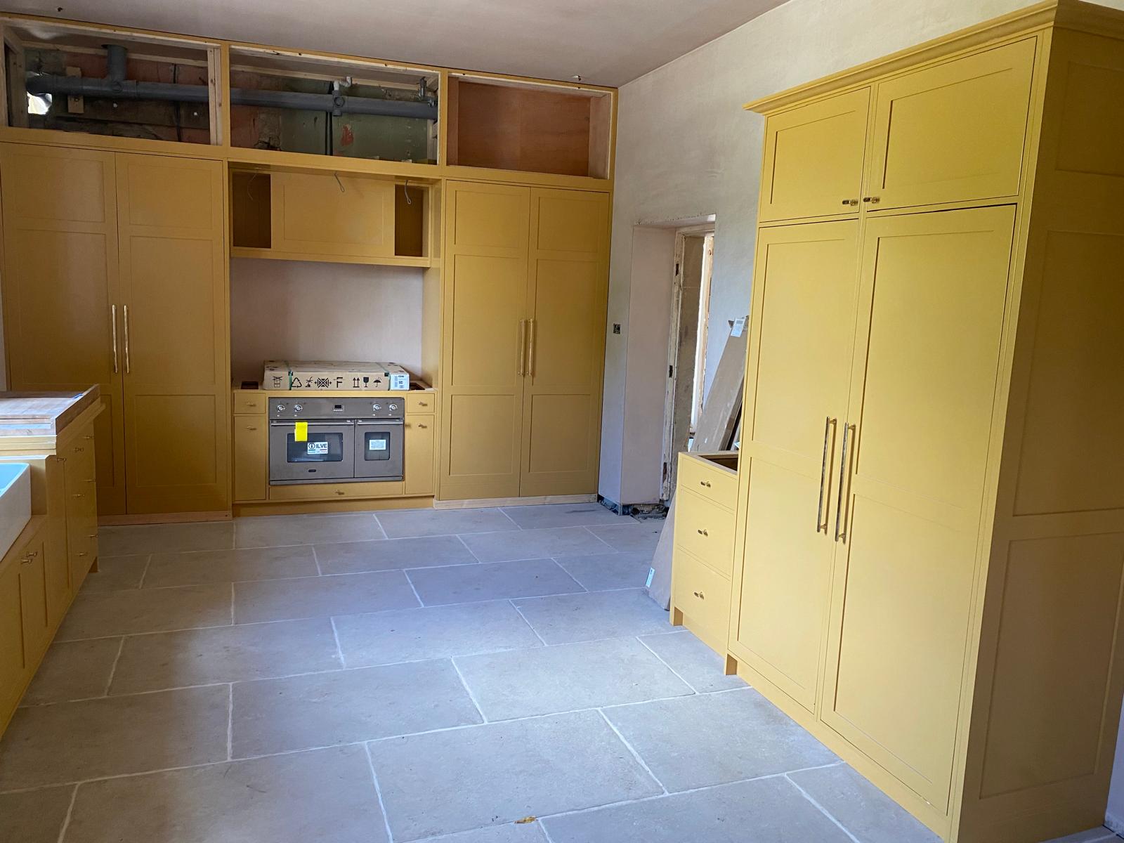 Kitchen joinery installation in progress at a character property