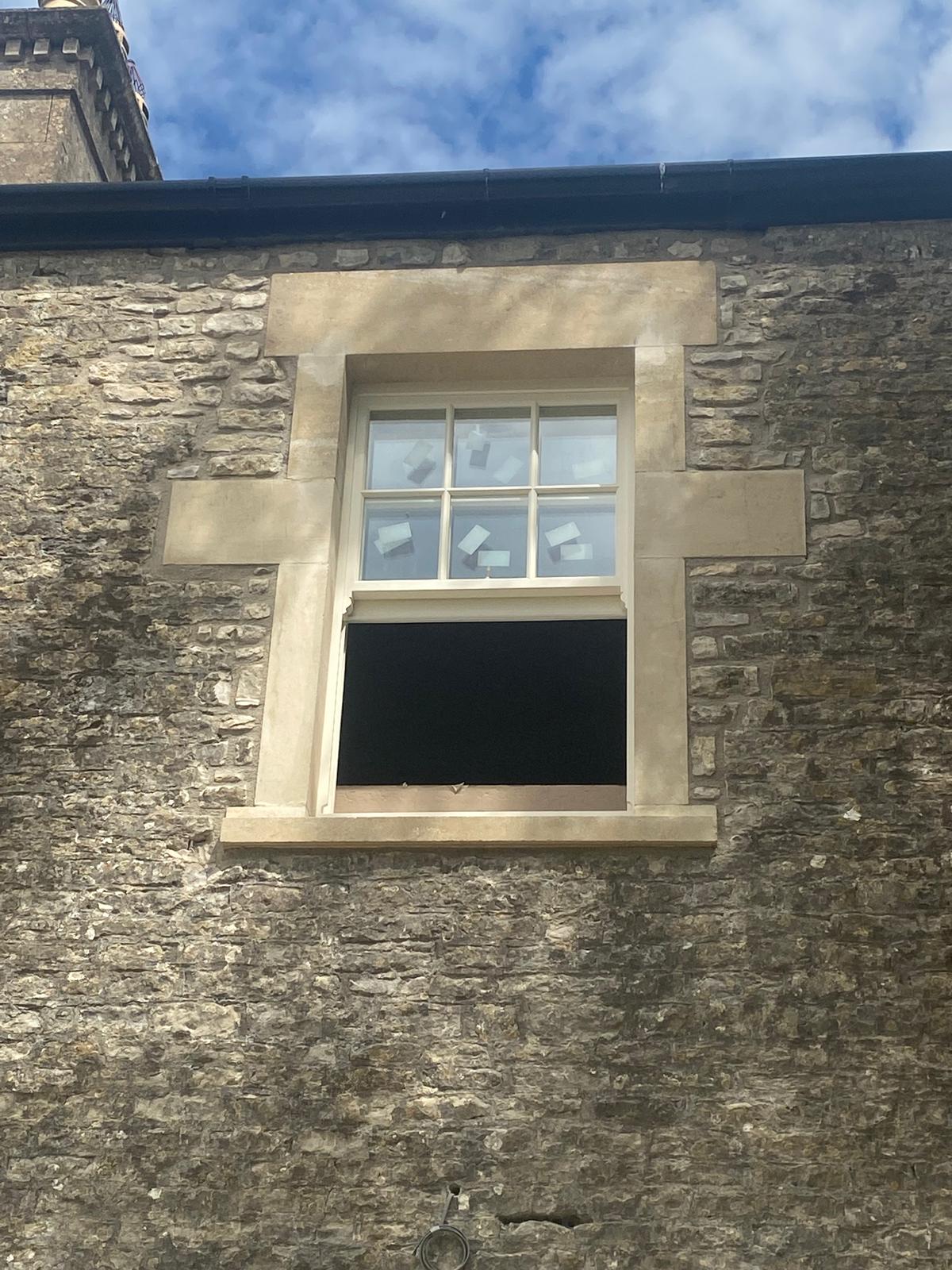 Stone window restoration in progress