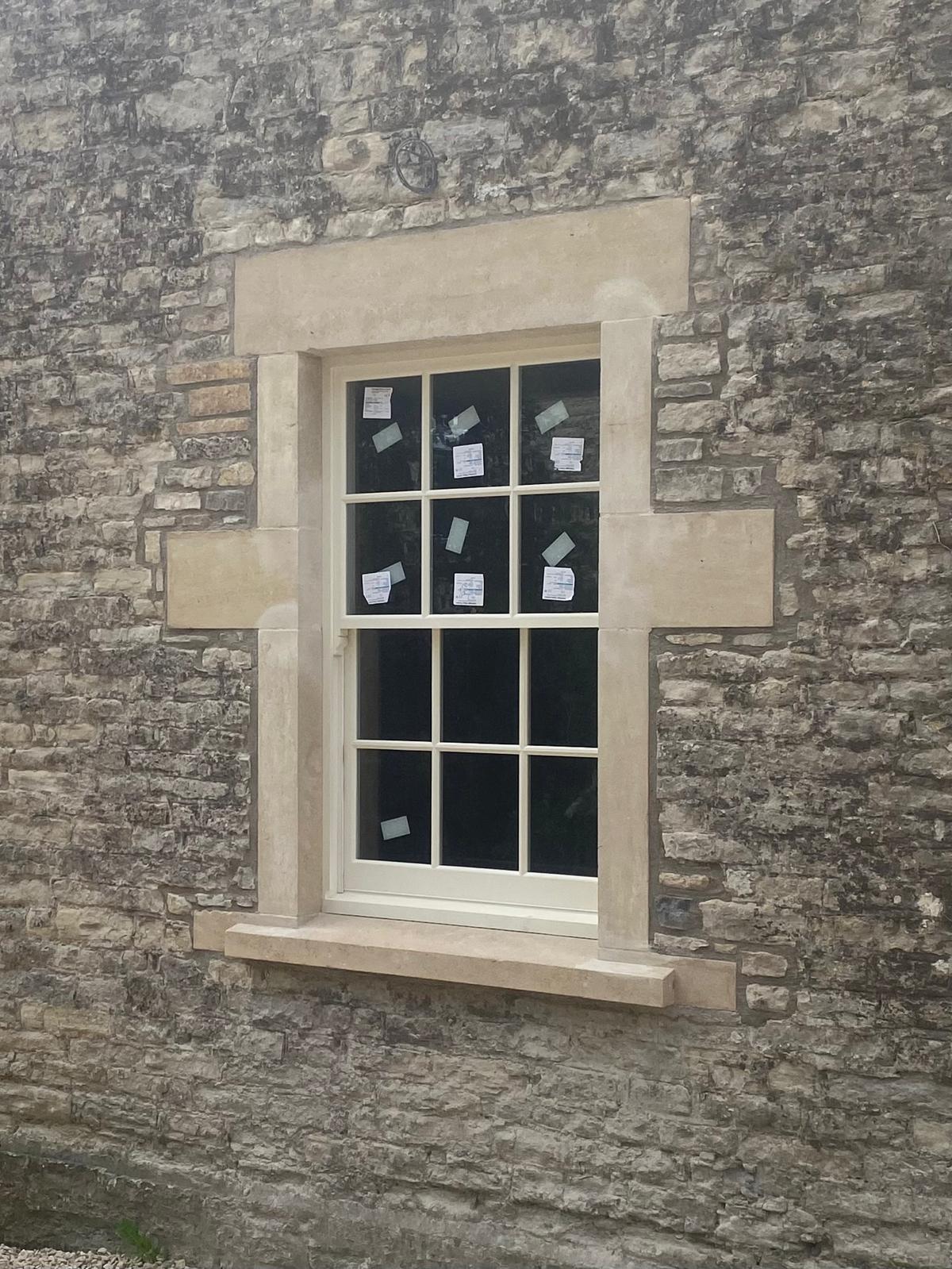 Second restored stone window and wall detail